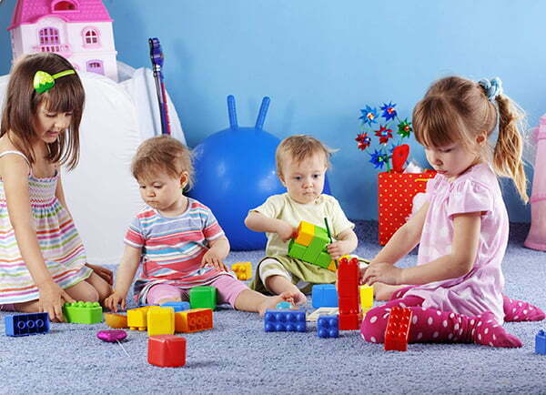 4 children playing in a daycare in Calgary